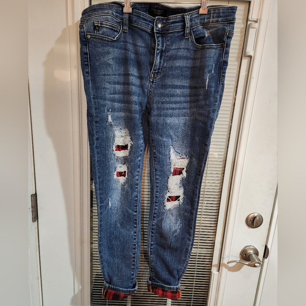 Womans Distressed Blue Jeans